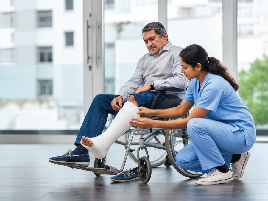 Caregiver assisting a person living with Parkinson's disease
